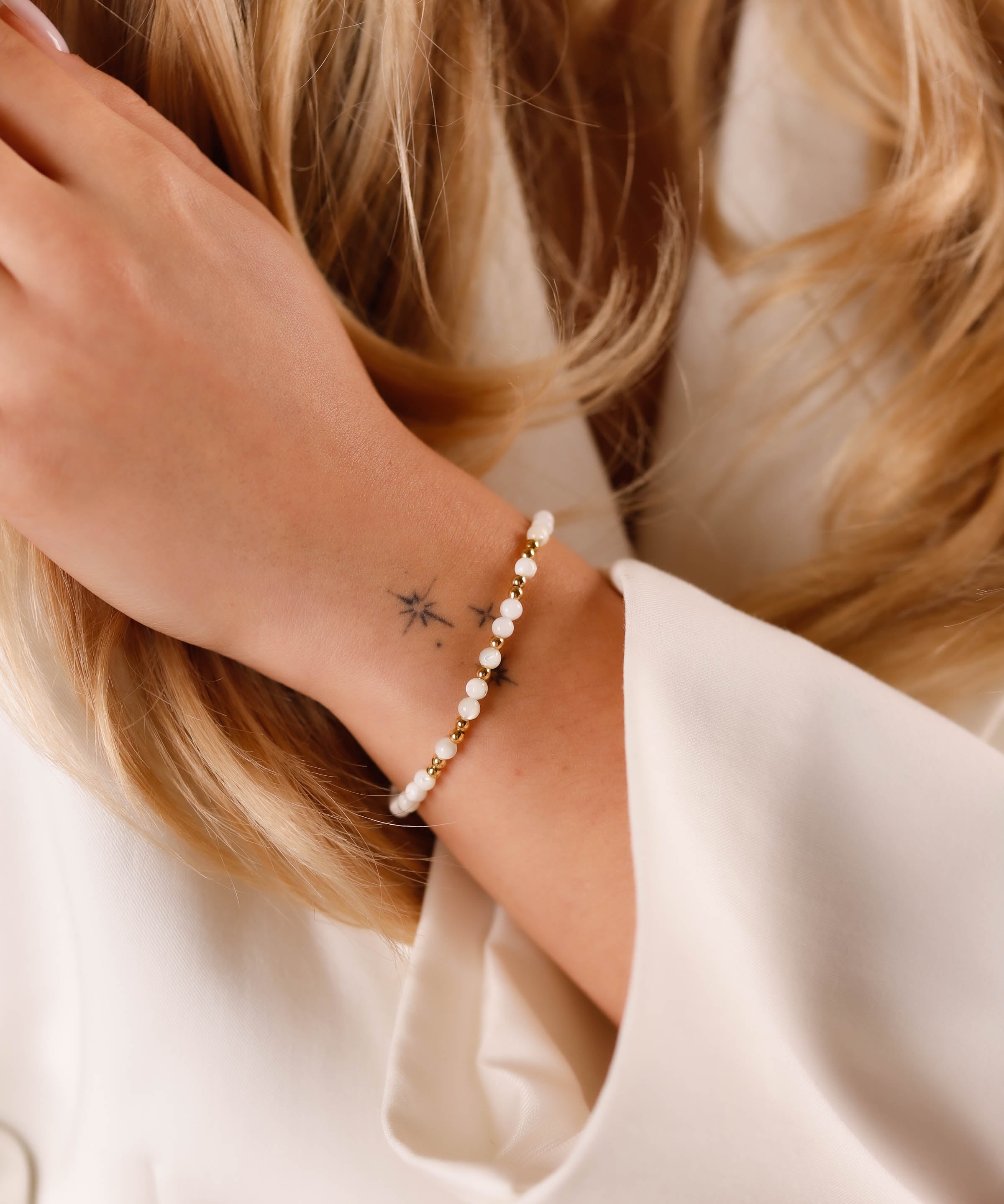 bracelet perle en plaqué or et nacre pour femme 