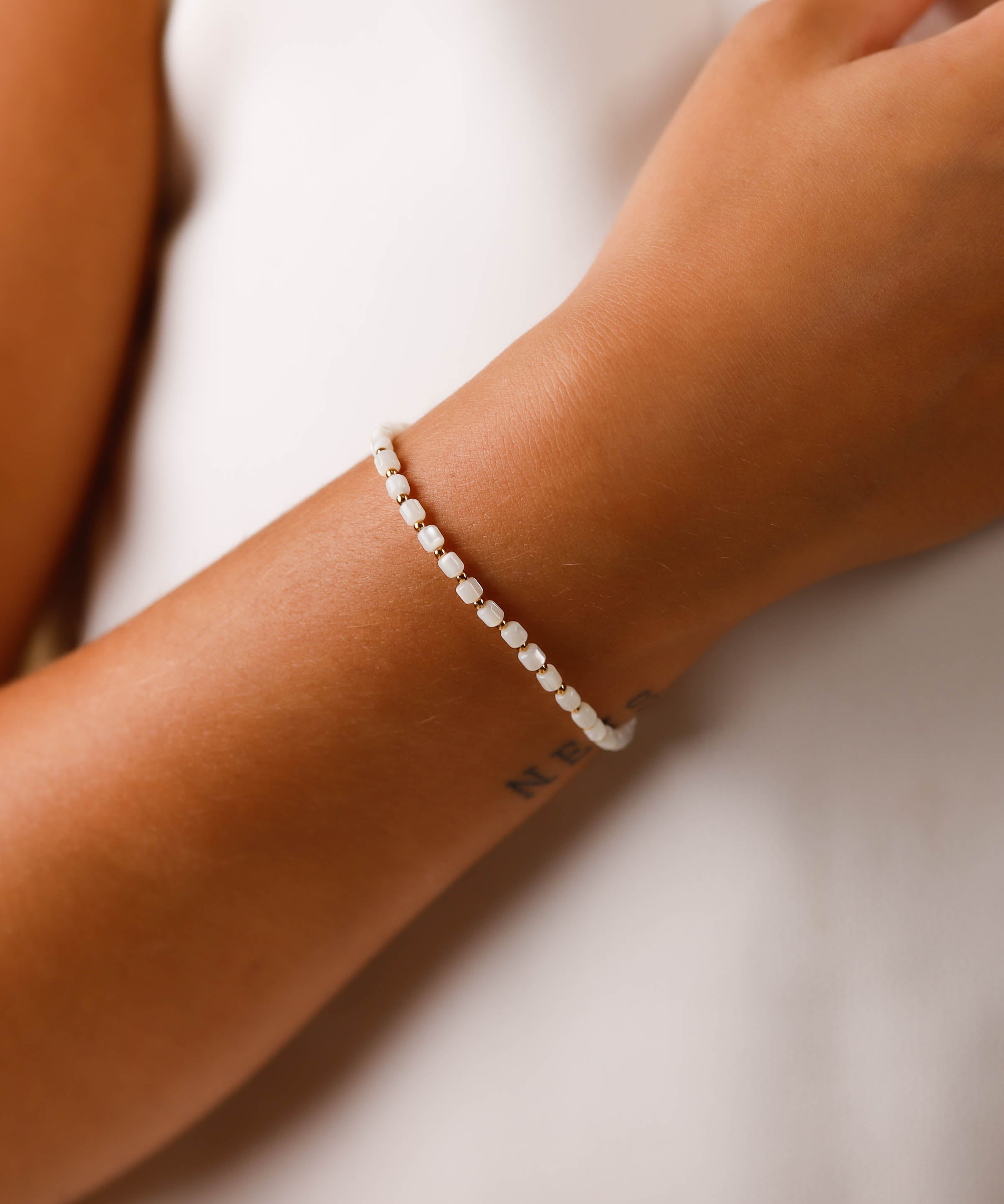 bracelet perle en acier inoxydable et nacre pour femme 
