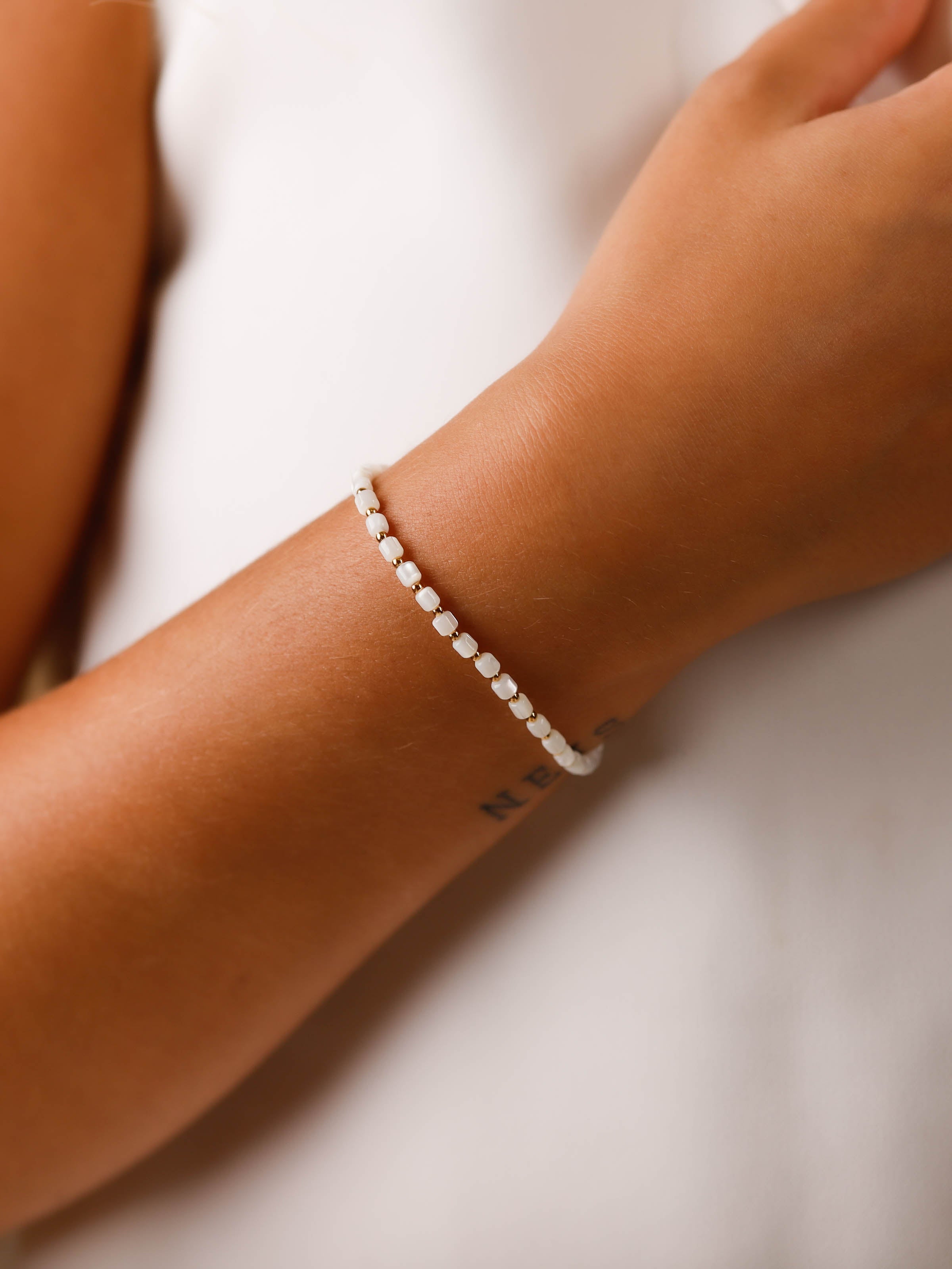 bracelet perle en acier inoxydable et nacre pour femme 