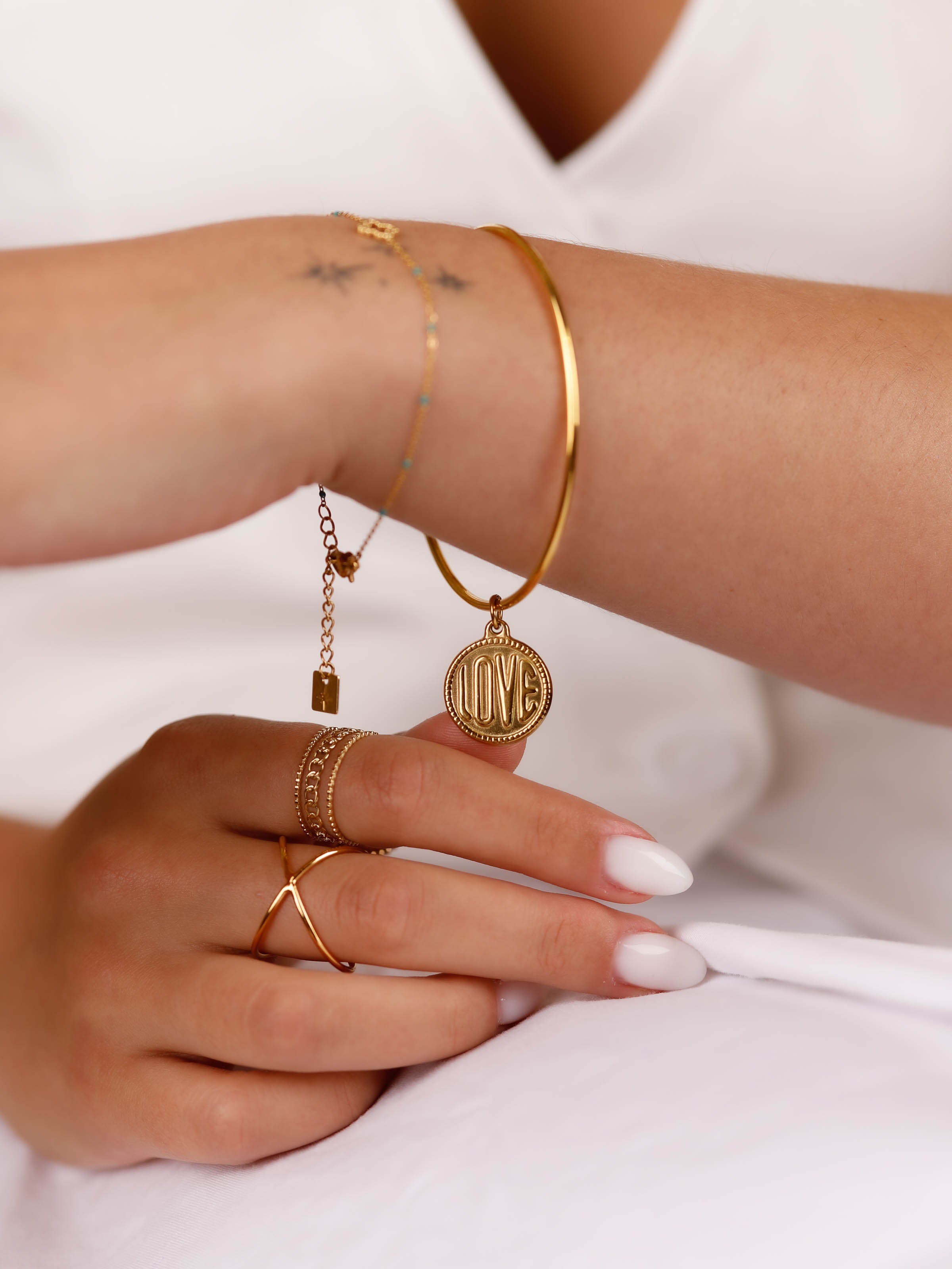 bracelet jonc en acier inoxydable avec breloque pour femme 