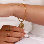 bracelet jonc en acier inoxydable avec breloque pour femme 