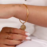 bracelet jonc en acier inoxydable avec breloque pour femme 