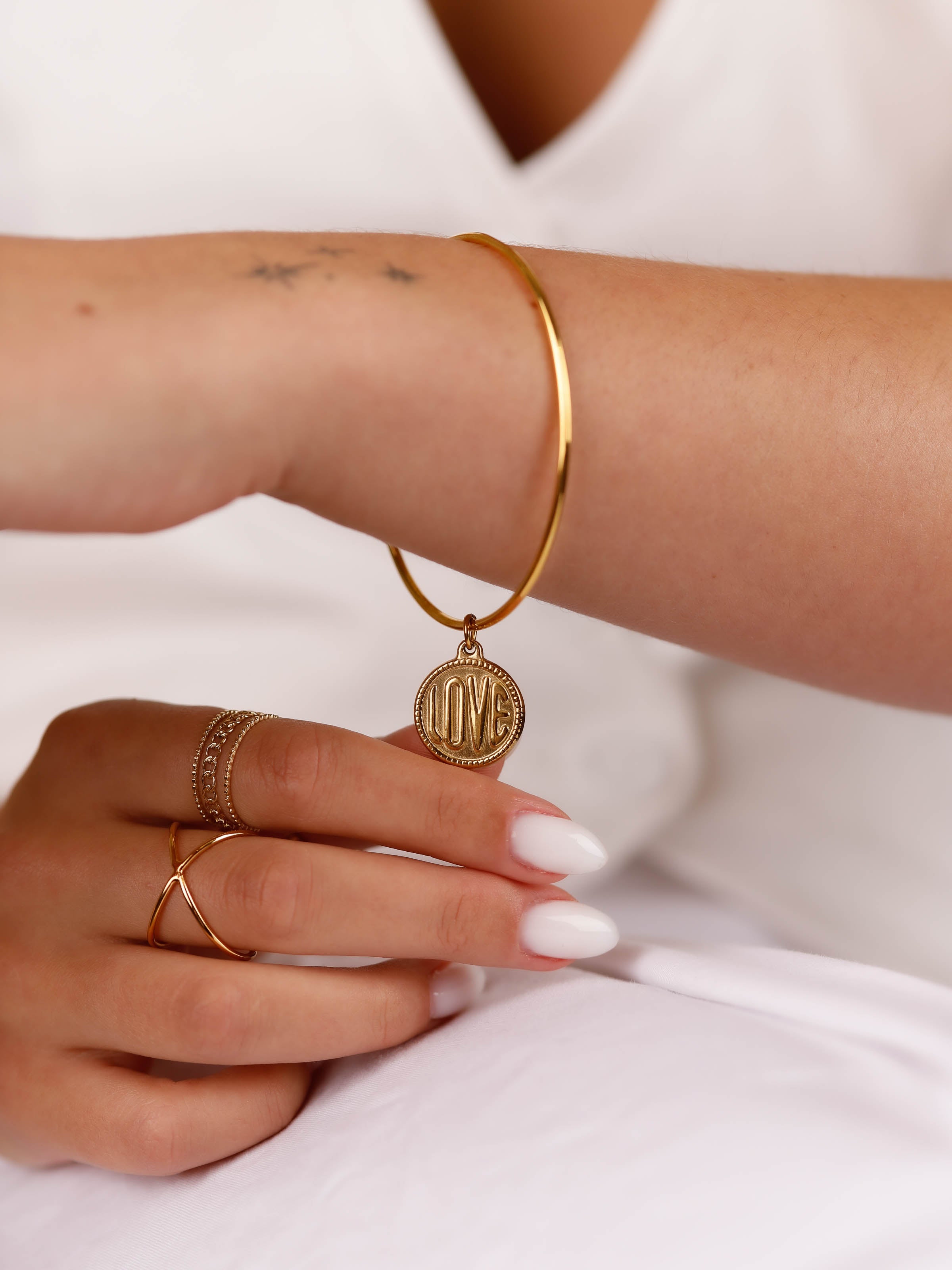 bracelet jonc en acier inoxydable avec breloque pour femme 