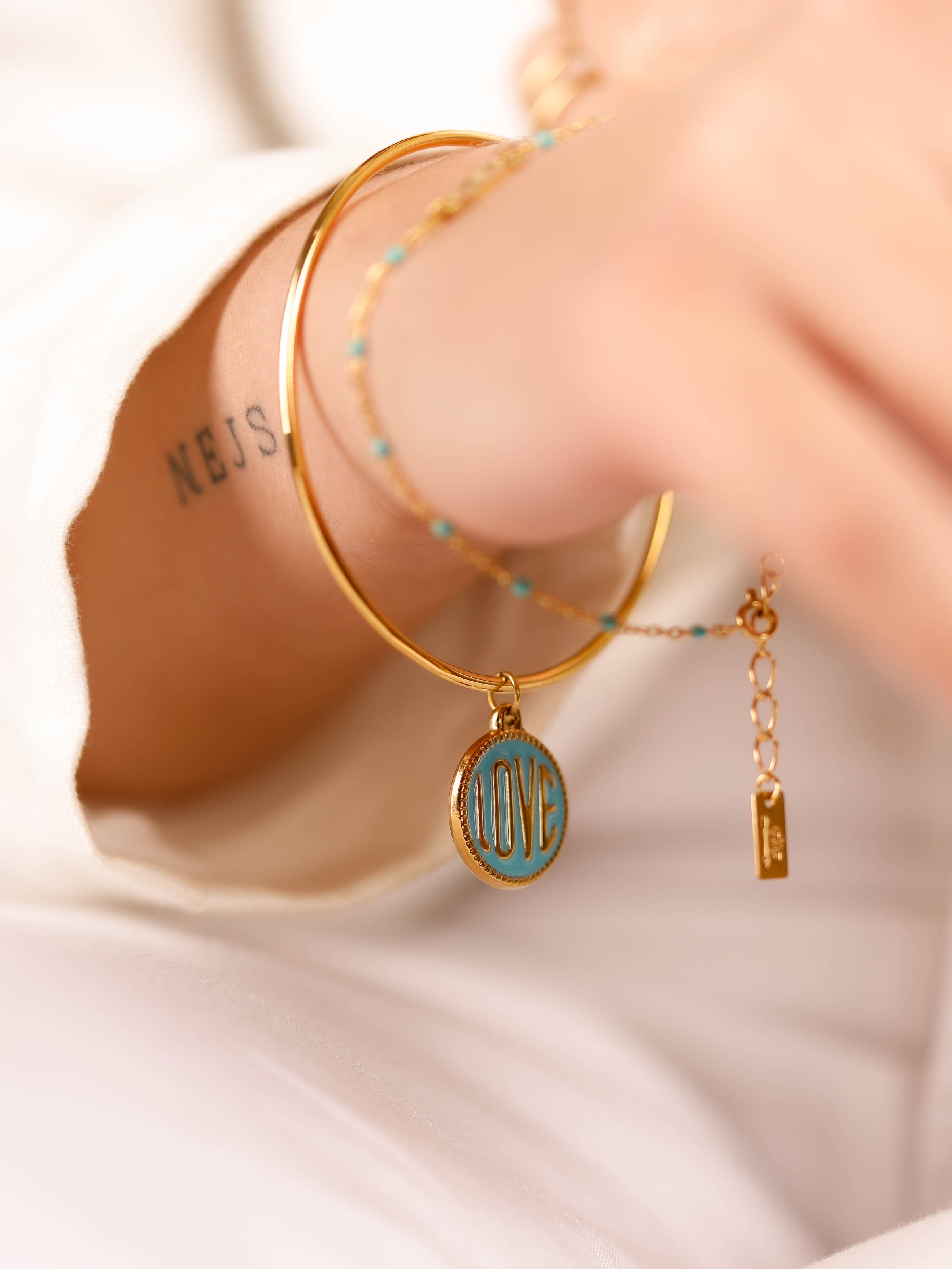 bracelet jonc en acier inoxydable avec breloque pour femme 