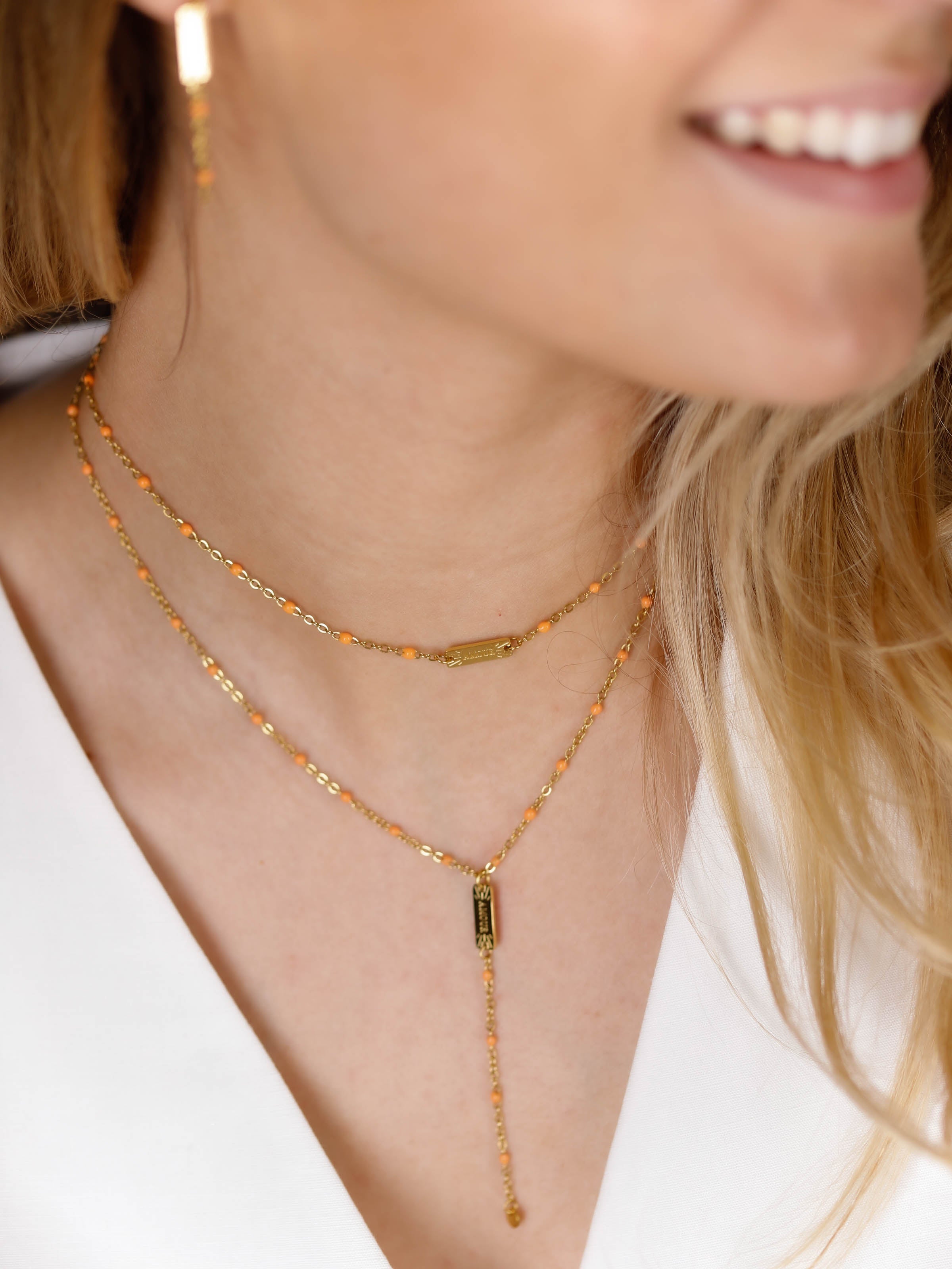 collier en acier inoxydable et résine pour femme 