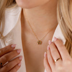 collier en acier inoxydable avec fleur pour femme